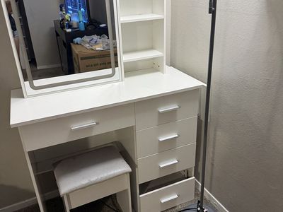 White Vanity Table with Lighted Mirror, Shelves, Drawers, and Matching Stool