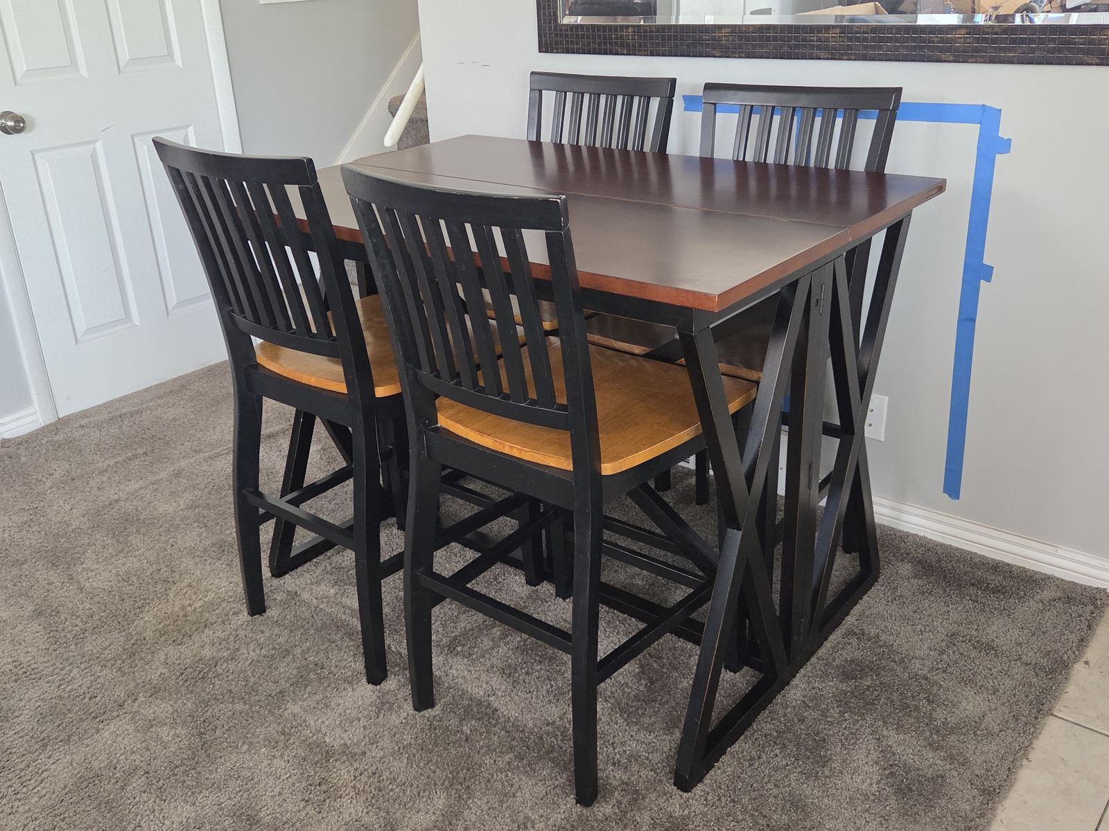 Counter height drop leaf table and four chairs