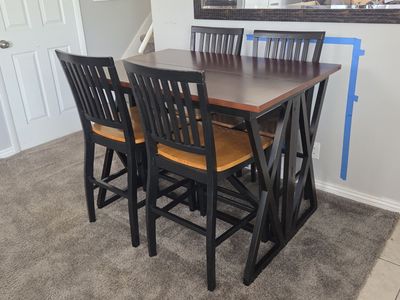 Counter height drop leaf table and four chairs