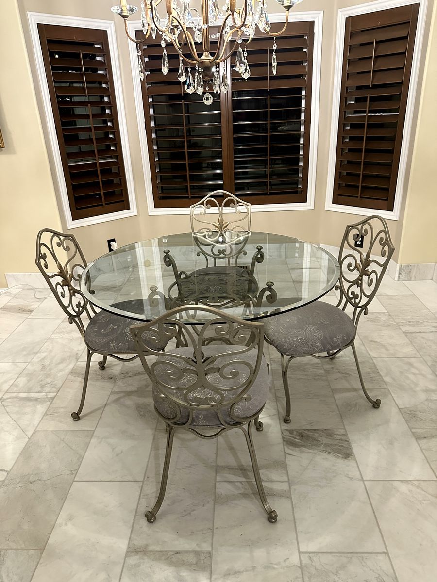4 foot diameter round glass table with 4 chairs