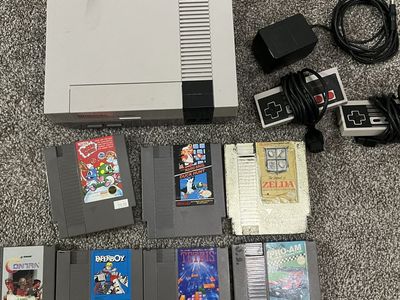 Original Nintendo Console and 7 games