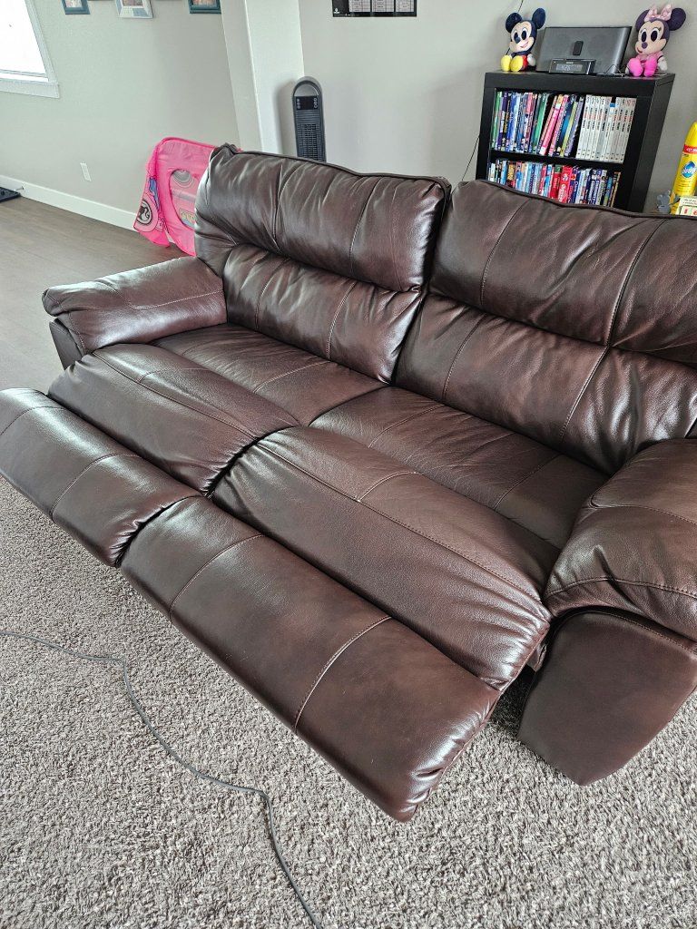 2 leather reclining couches