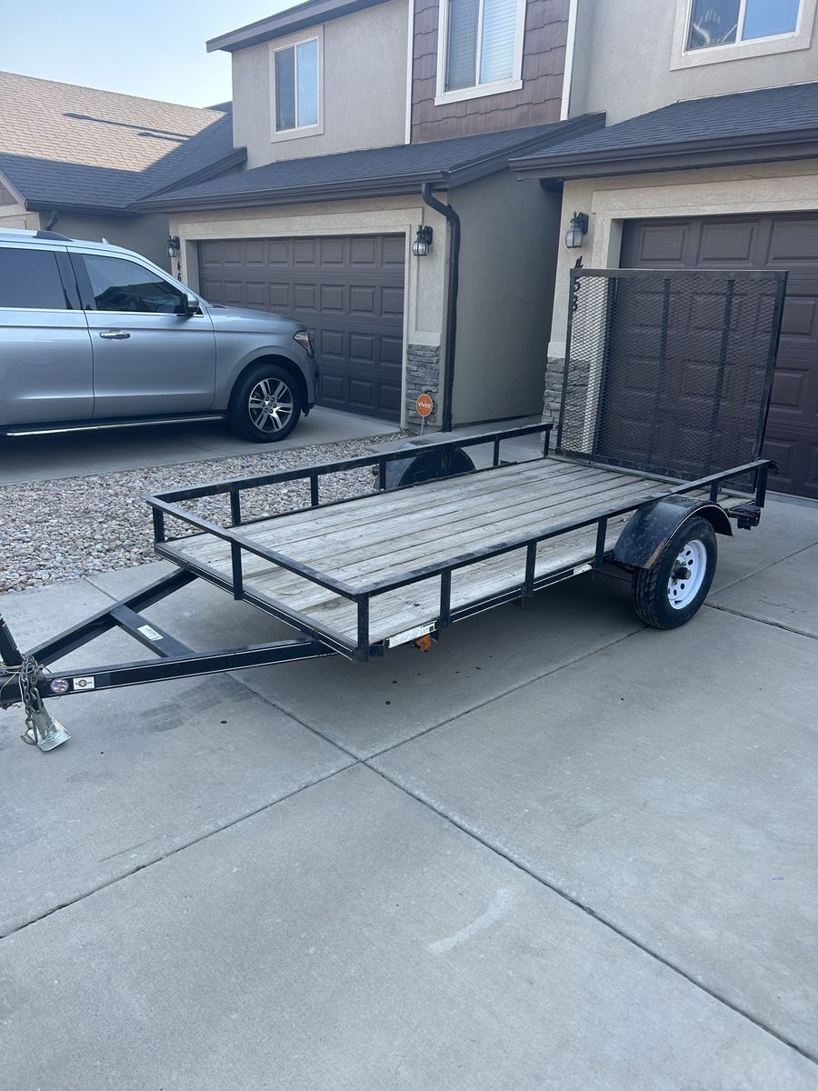 Utility Trailer 5’x10’ with Wood Deck and Ramp Gate - Used