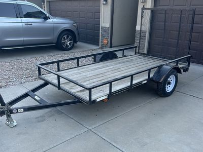 Utility Trailer 5’x10’ with Wood Deck and Ramp Gate - Used