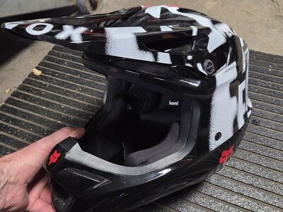 Fox V3 motocross helmet.