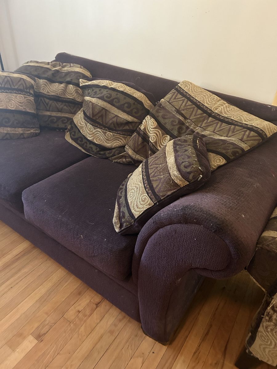 Plum Purple and Gold Fabric Couch with Patterned Throw Pillows and Matching Chair
