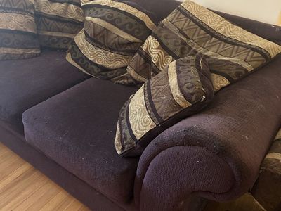 Plum Purple and Gold Fabric Couch with Patterned Throw Pillows and Matching Chair