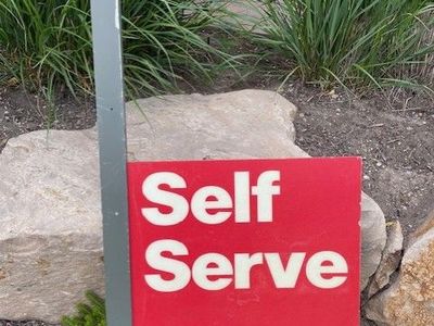 Self Serve Gas Station sign