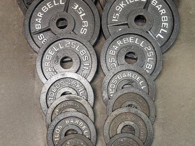 255 pounds of Olympic weights