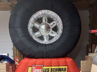 HALF PRICE! BRAND NEW Custom “Les Schwab” Inflatable Tire/Wheel