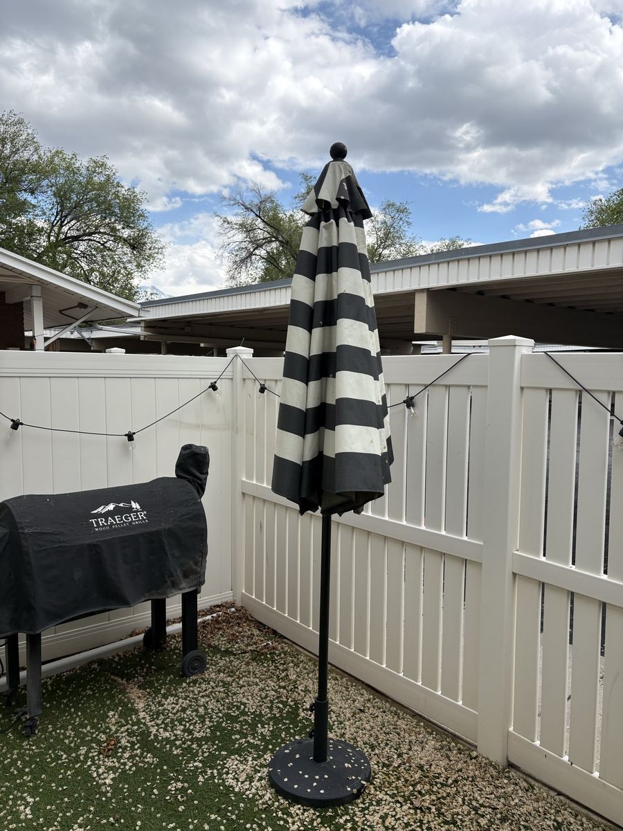 Black and white umbrella with base