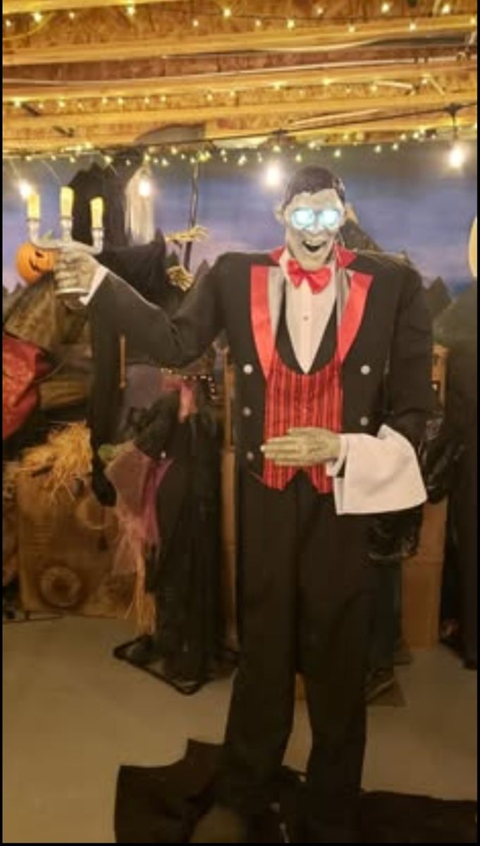 Animated Butler Vampire Halloween Prop with Candelabra and Light-Up Eyes