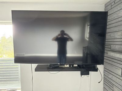 65 Inch TCL Roku With Articulating Wall Mount