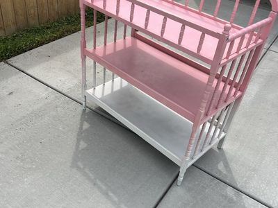 Pink and White Wooden Baby Changing Table with Pad and Storage Shelves
