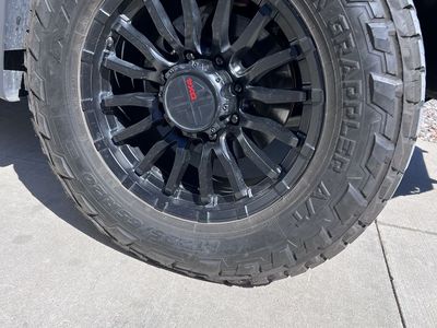 4 Ridge Grappler AT 295 65 20 GM 8 180 like new