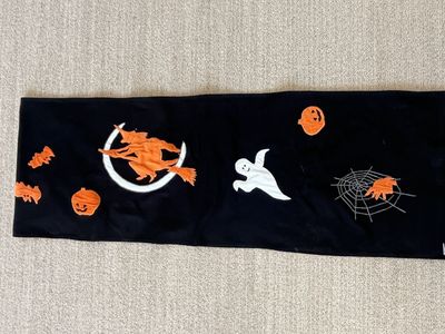Fun, appliquéd, beaded Halloween table runner. 88” long 15.5” wide, excellent condition