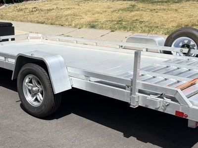 All aluminum 2022 7x14 trailer Aluma heavy duty trailer utility flat bed with spare tire. Like new