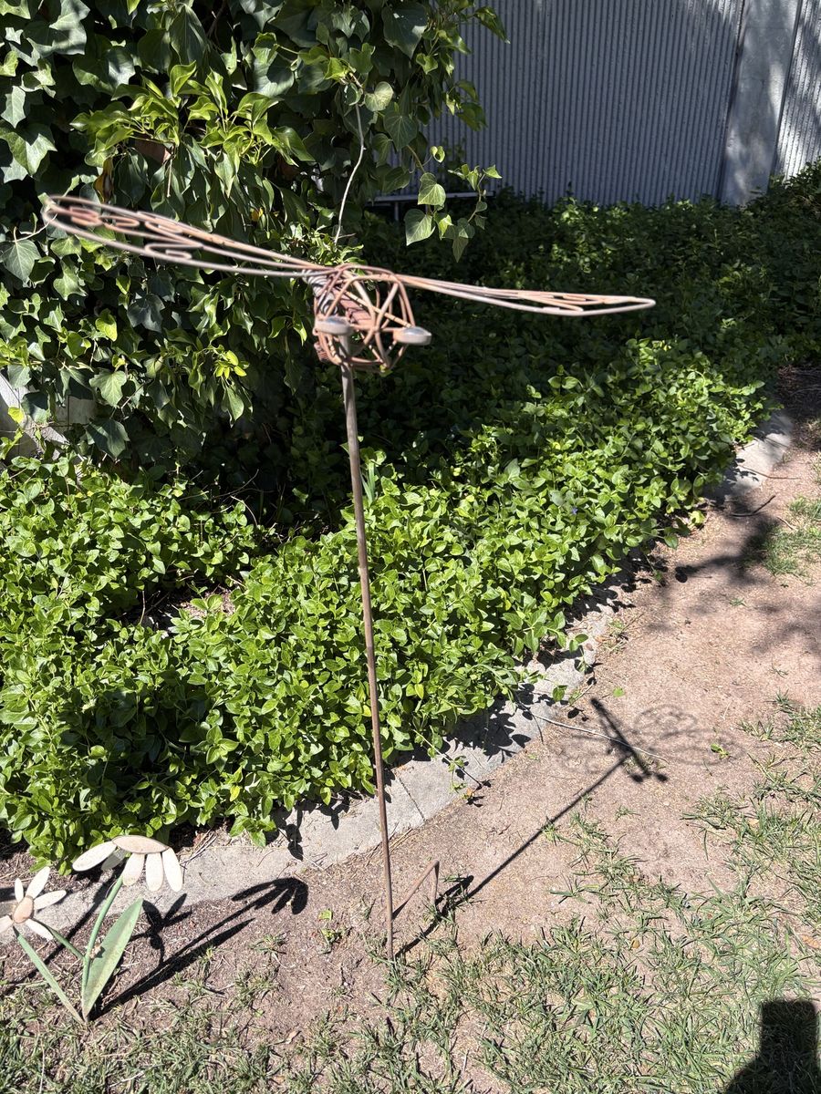 Tall dragonfly yard stake.