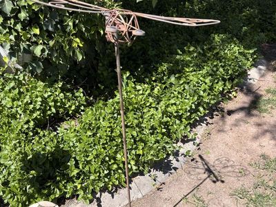 Tall dragonfly yard stake.