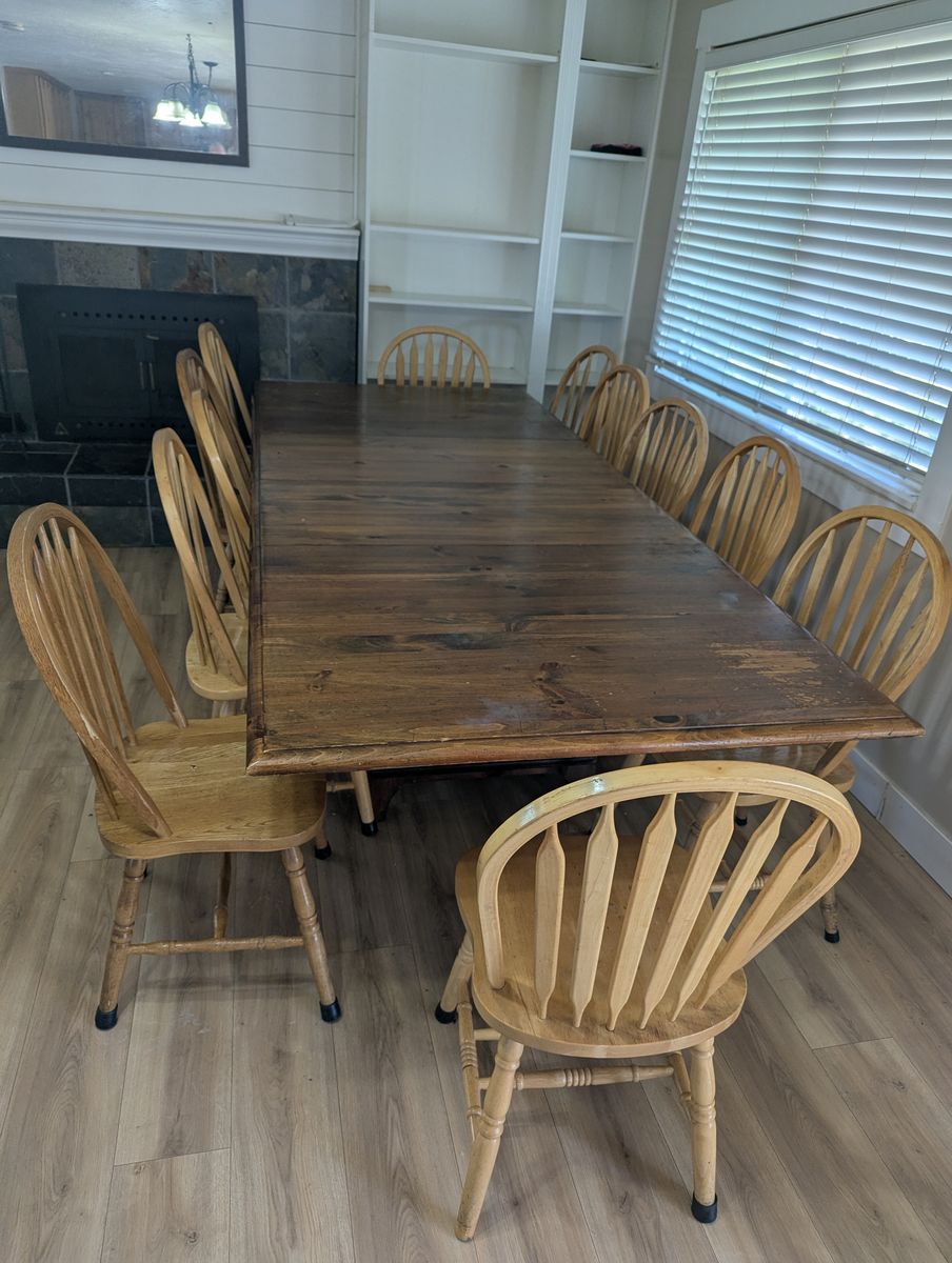 Wooden table with two removable sections and 12 quaker chairs