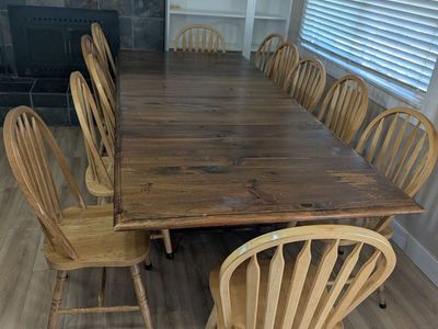 Wooden table with two removable sections and 12 quaker chairs