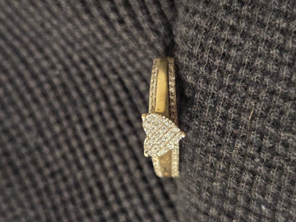 heart shaped .50 carot diamond with 14 k gold band