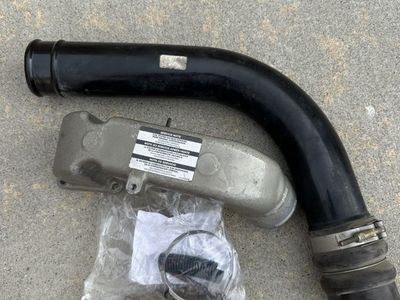 2004 CUMMINS STOCK INTAKE ELBOW