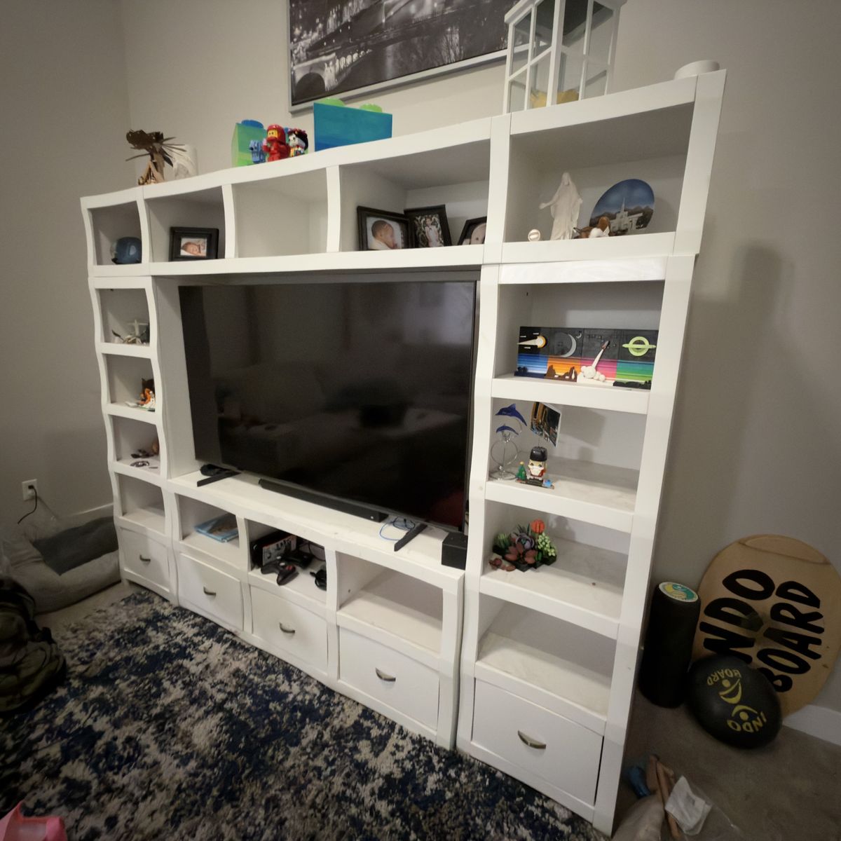 White Wood Entertainment Center TV Stand, with two side sections and a top section with Shelves & Drawers