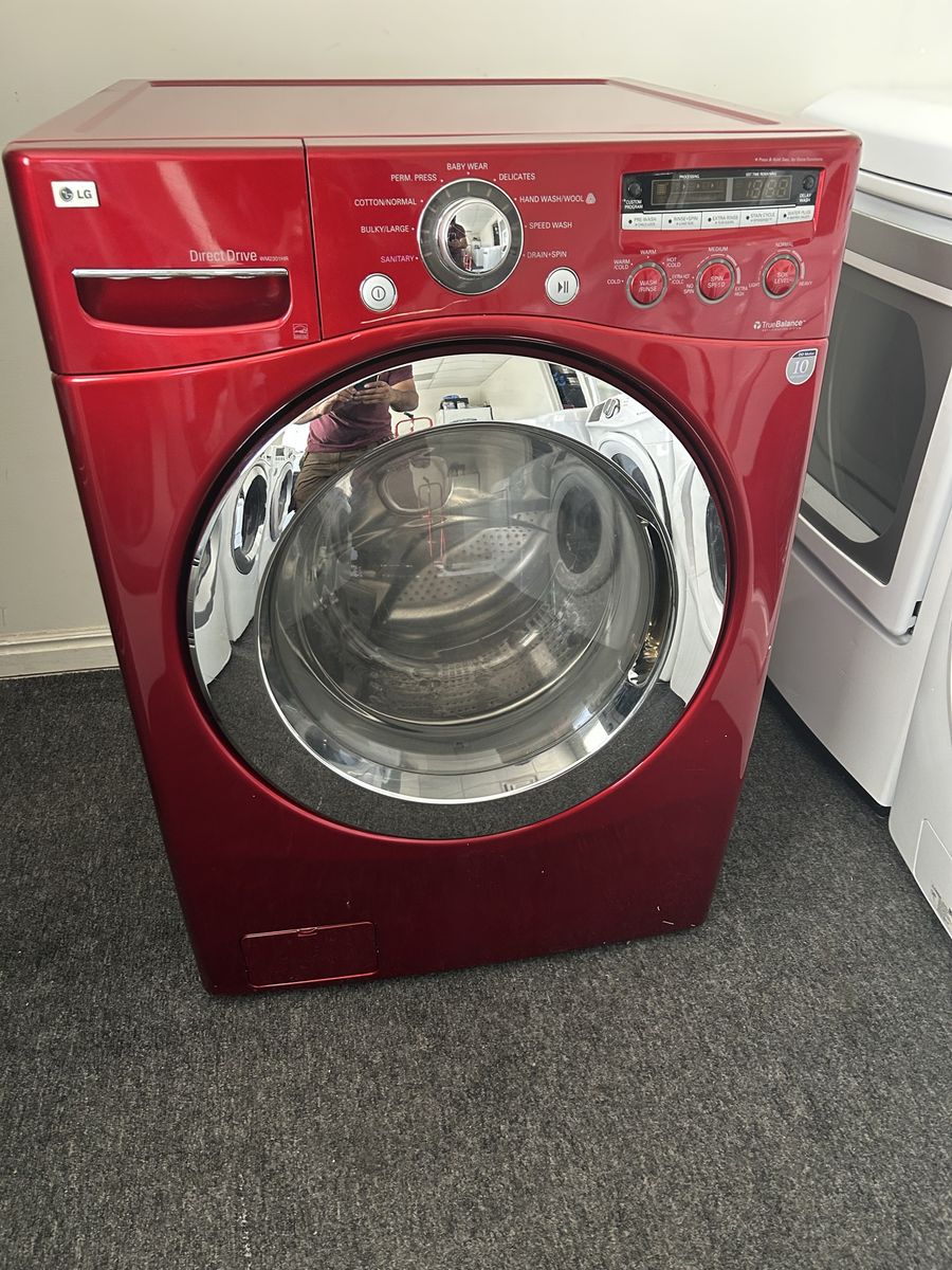 Red LG ultra capacity washing machine