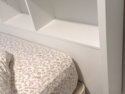 Full size mattress, box spring, frame, and bookcase headboard.