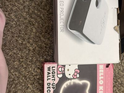 Led Projector And Hello Kitty Walla Decor