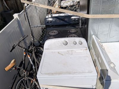 washer, dryer, stove and a fridge