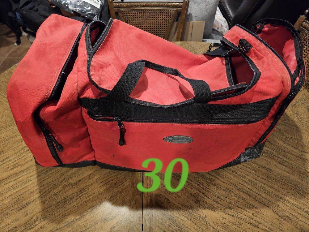 Multiple duffel bags, backpacks, camelbacks, etc.