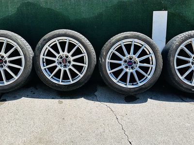 OEM Enkei 12-Spoke JDM Subaru STi Legacy/Liberty Wheels 18x7.5 5x100 ET55 (Set of 4)
