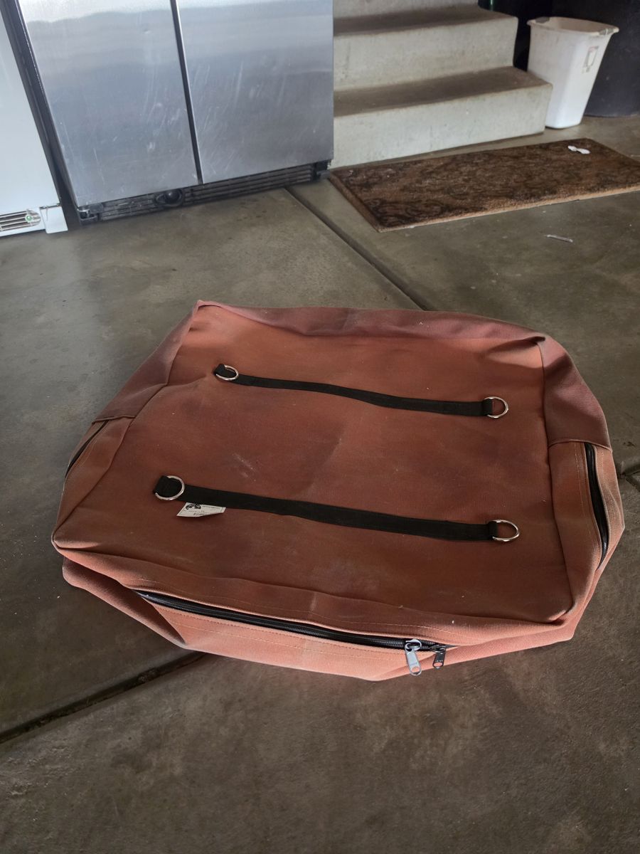 Pack topper and hand made recurve bow.