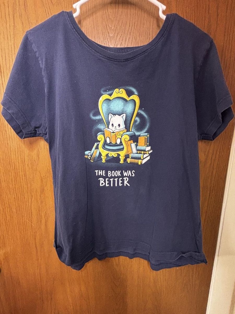 Teeturtle "The Book Was Better" Cat Reading Graphic Tee - Women's Blue T-Shirt, Size M