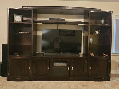 Large Dark Wood Entertainment Center with Display Shelves and Storage Cabinets