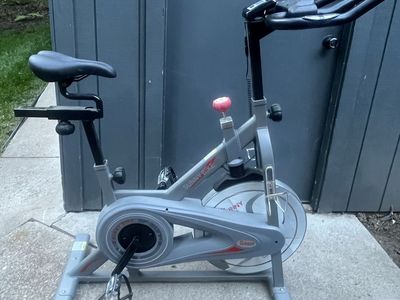 Sunny Health & Fitness Upright Magnetic Spin Bike - Smooth Cardio Workout