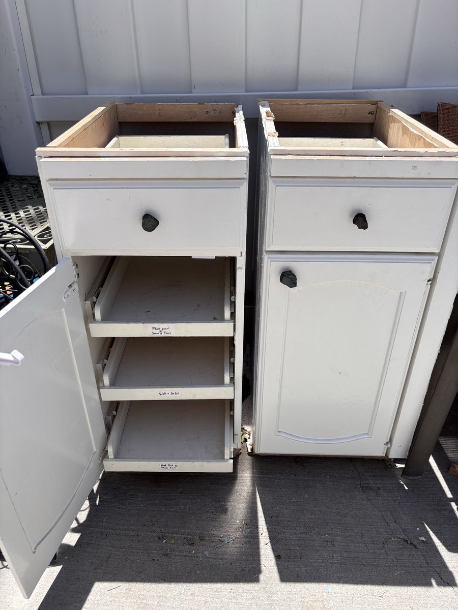 Pair of Base cabinets each have 3 pull out storage drawers