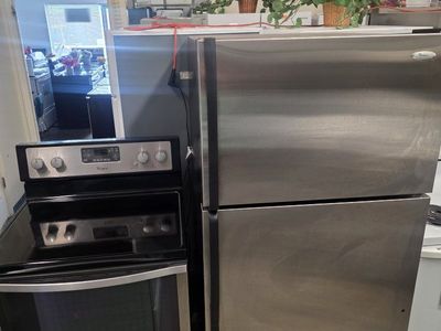 whirpool refrigerator and electric stove