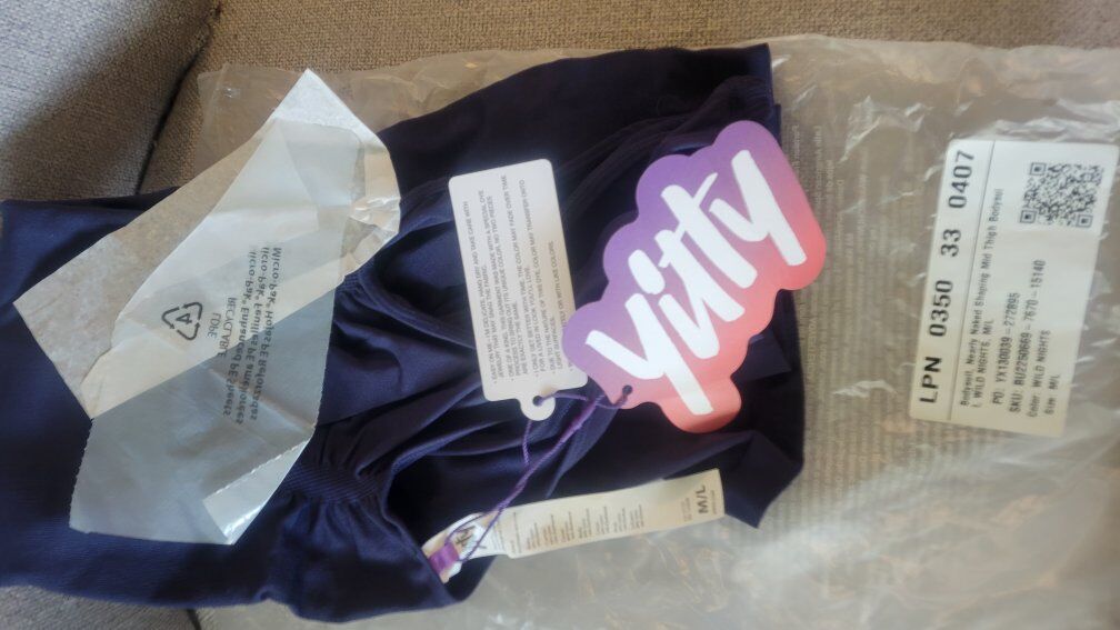 yitty brand size med/large shape wear mid thigh bo