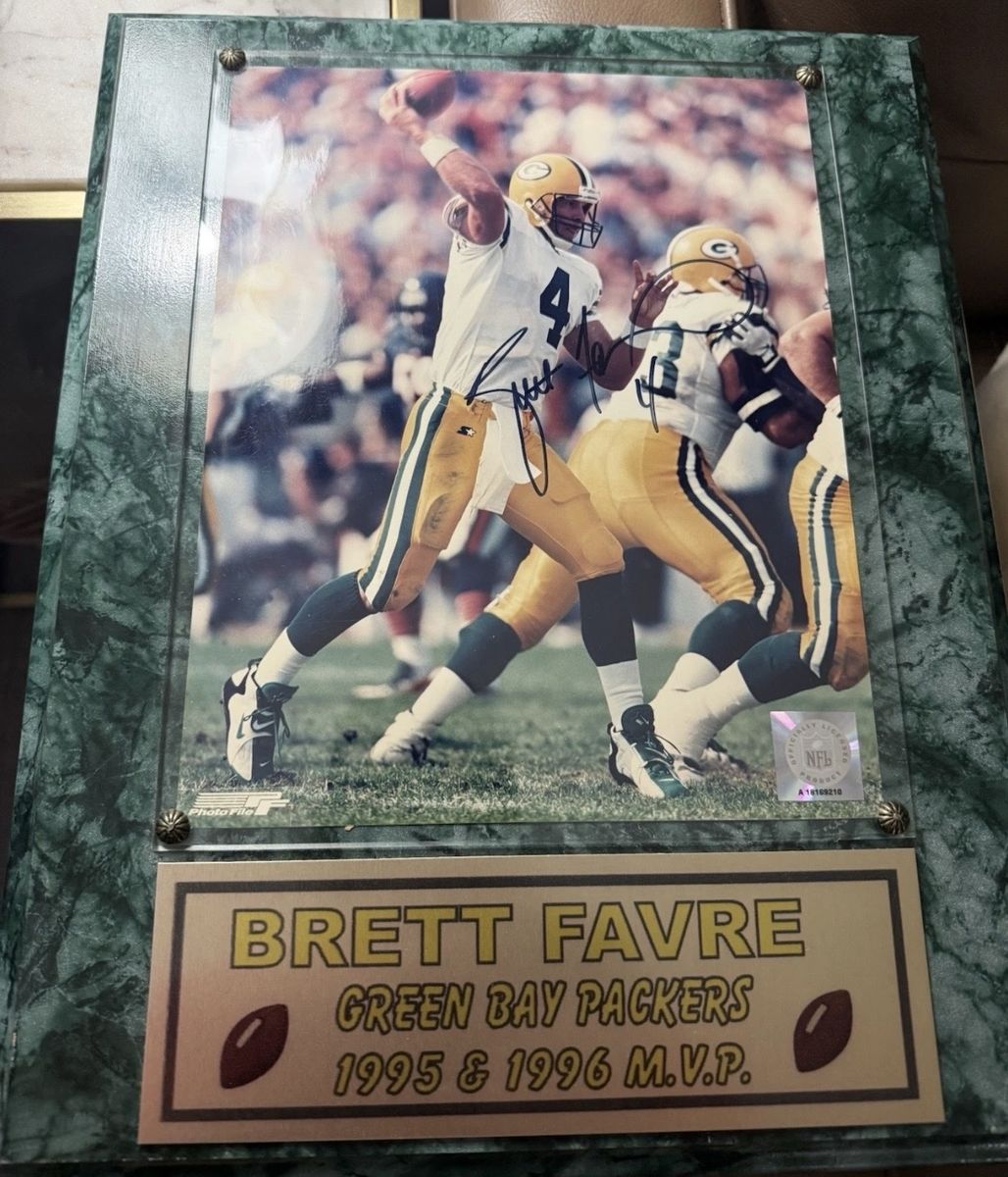 Autograph Hand Signed Brett Favre Green Bay Packers 1995 & 1996 MVP Autographed Commemorative Plaque w/COA card.