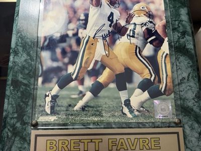 Autograph Hand Signed Brett Favre Green Bay Packers 1995 & 1996 MVP Autographed Commemorative Plaque w/COA card.