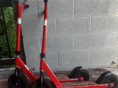Red Razor Scooters with All-Terrain Wheels - Great for Off-Road Adventures!