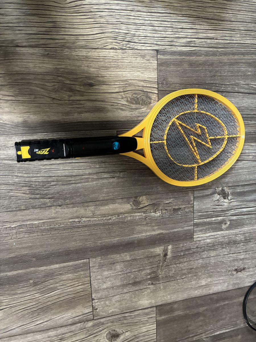 The Fly Terminator  Electric Bug Zapper Racket – End the War on Flies Instantly ($5)