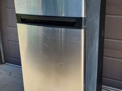 Haier Top Freezer Refrigerator Stainless Steel - Compact & Clean