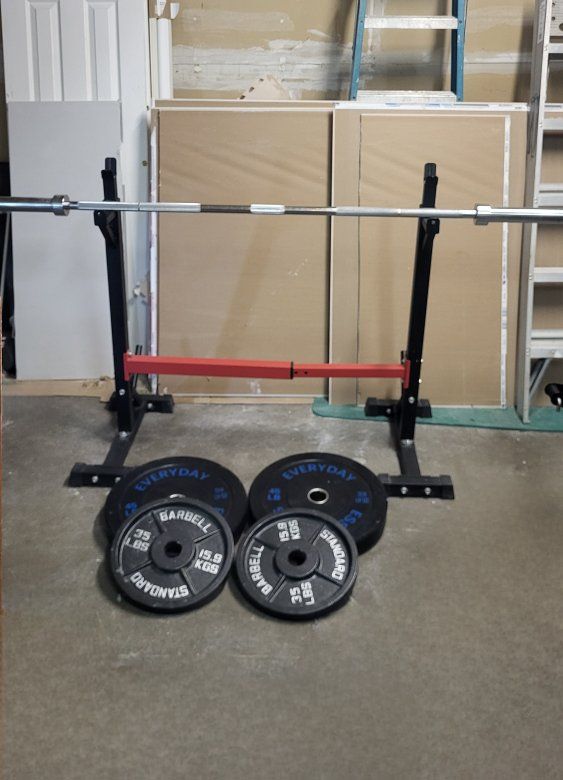 Squat rack and 160 pounds of weights
