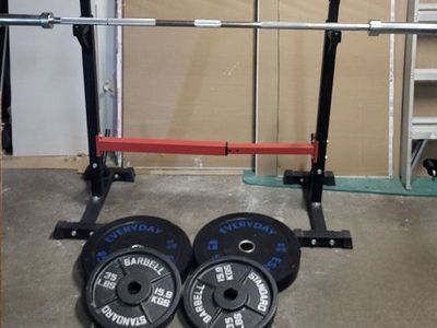 Squat rack and 160 pounds of weights