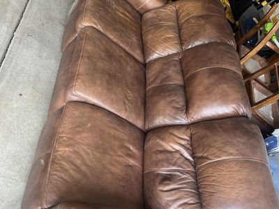 Reclining sofa and love seat. Leather.