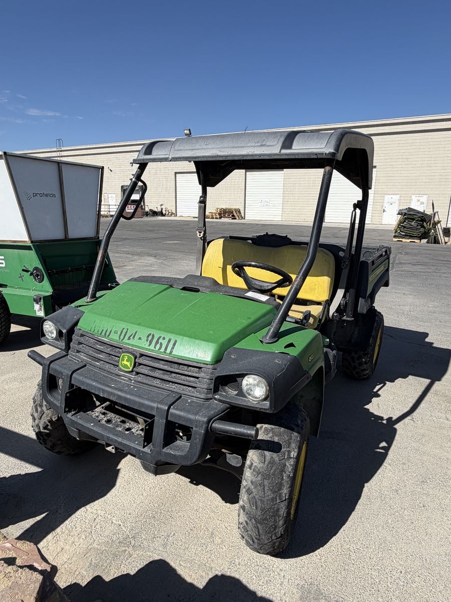 John Deere Gator XUV Utility Vehicle - Green and Yellow 4x4 UTV